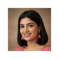 A pair of traditional Indian jhumka earrings with pink beaded fringe and gold-tone hooks, displayed on a white card against a solid gray background.