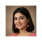 A pair of traditional Indian jhumka earrings with pink beaded fringe and gold-tone hooks, displayed on a white card against a solid gray background.